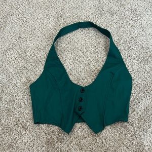 Cropped vest. It was too small for me.